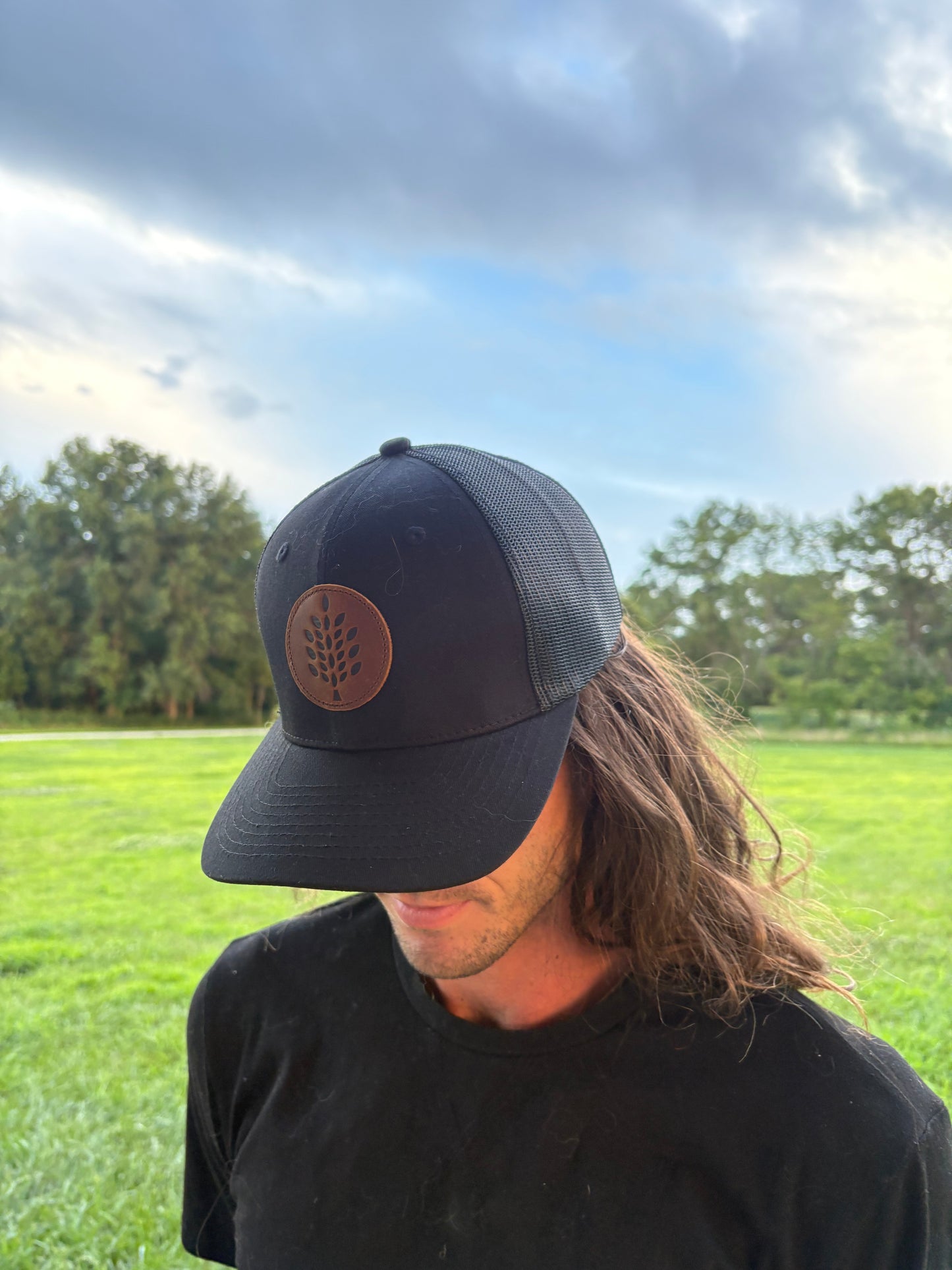 Black Trucker Hat with Leather Patch